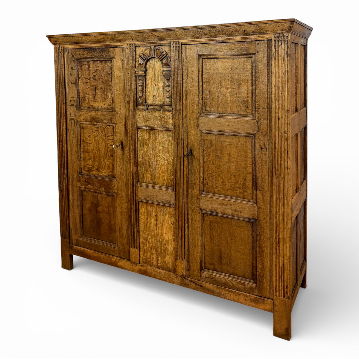 Continental Oak Cupboard with Arched Carved Panel