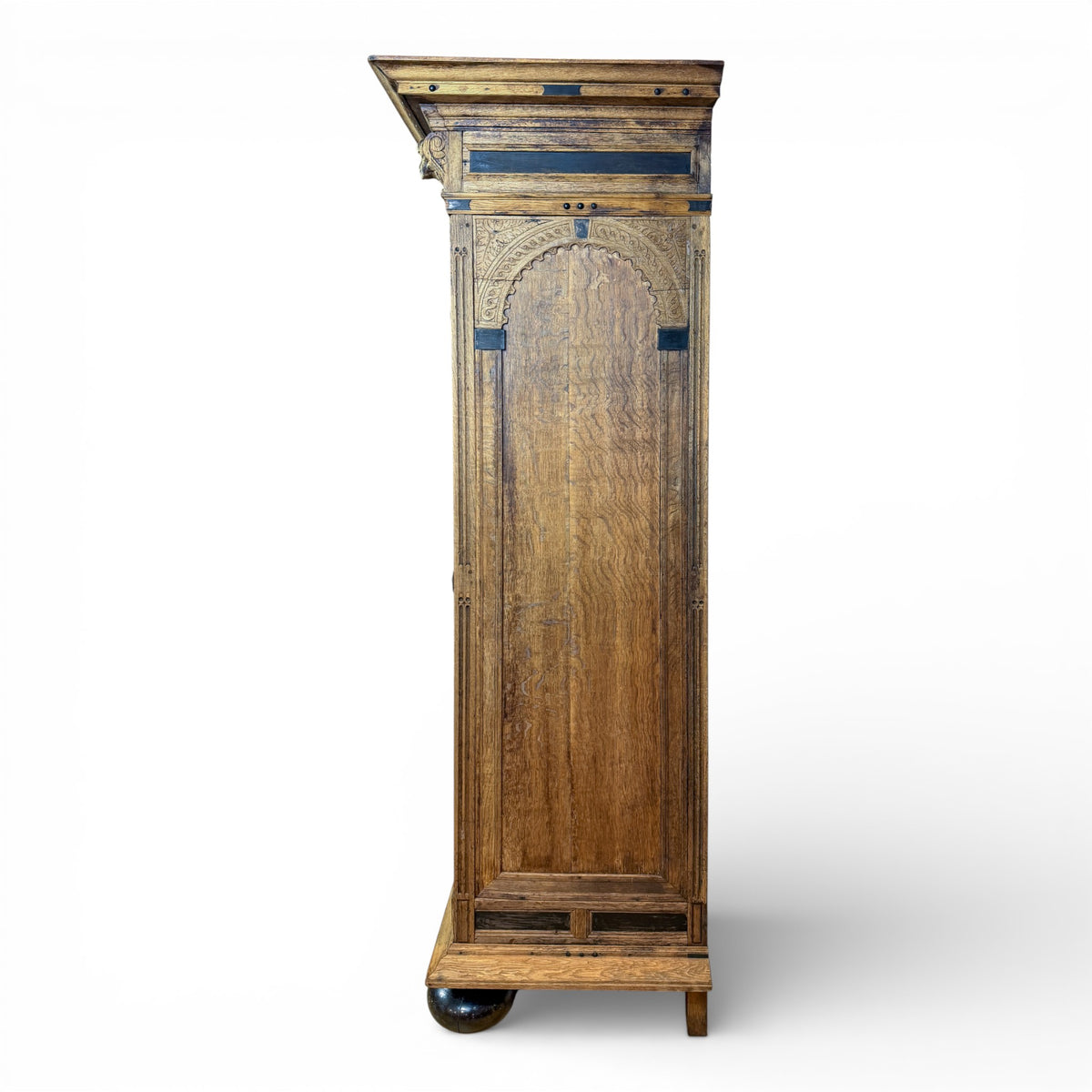 Oak Armoire with Carved Mask Corbels and Ebonized Details