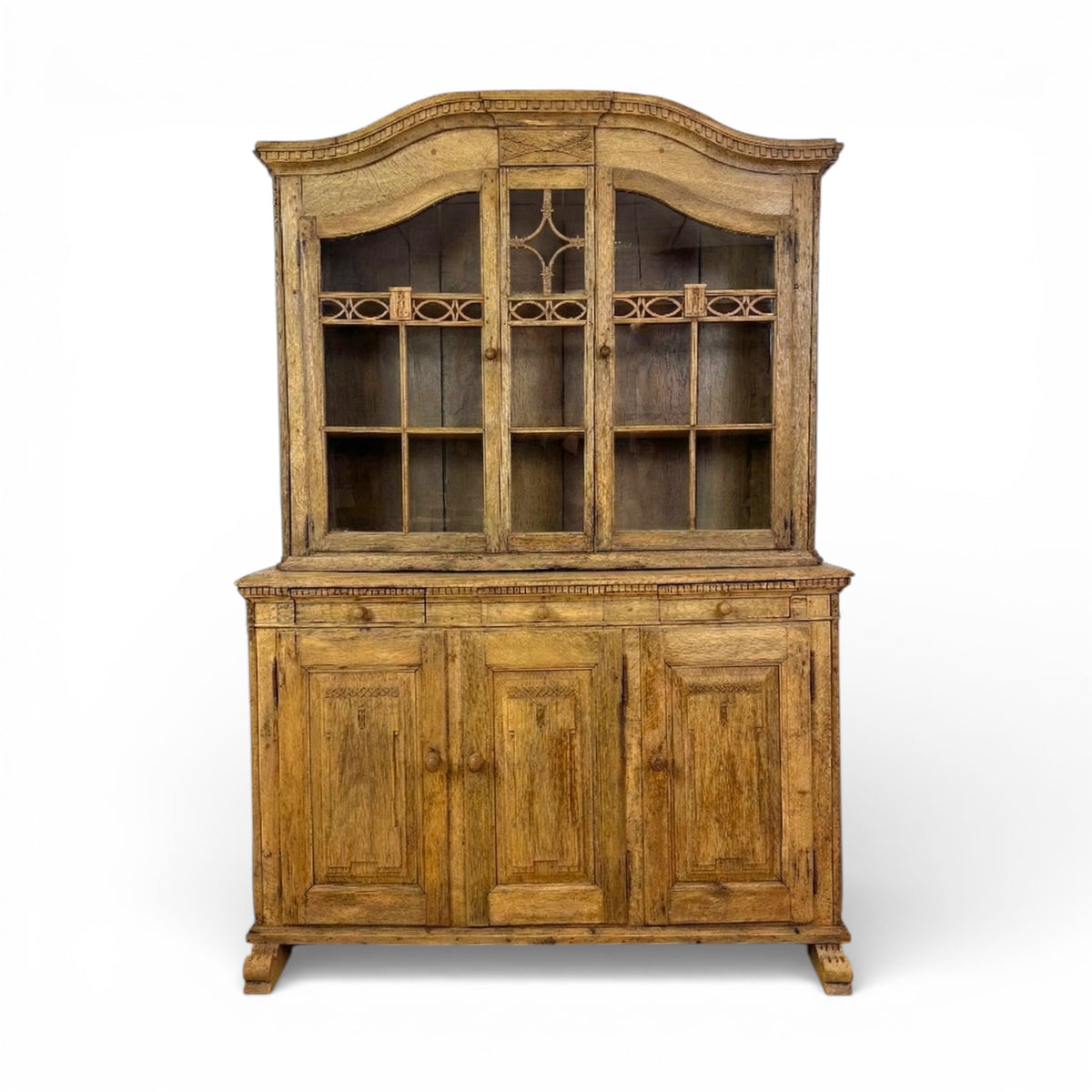 Wooden cabinet with glass doors on a white background